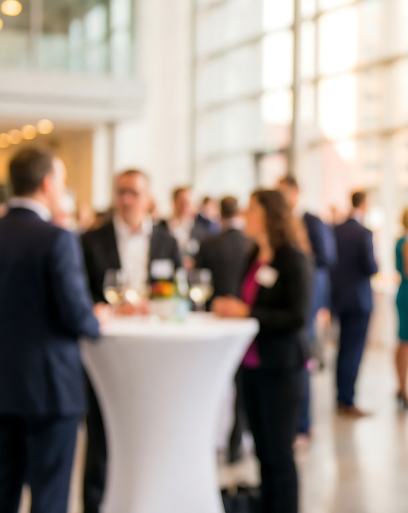 Guests networking at a PRSNTS drinks reception